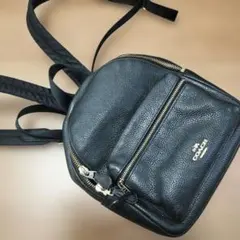 COACH ブラックレザーミニリュック スタッズ付き - メルカリ