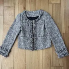 ツイード ノーカラージャケット フリンジ付き