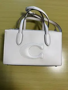 COACH エミー サドルバッグ23 ホワイト 百貨店COACH - メルカリ