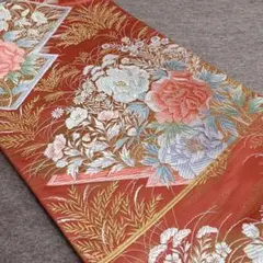 美品 赤茶系の唐織袋帯 四季草花 松竹梅 菊 吉祥文様 セミフォーマル