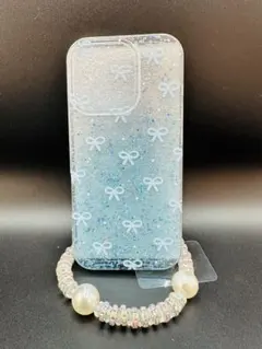 新品iPhone 16pro水色リボン模様ケースビーズストラップ付き