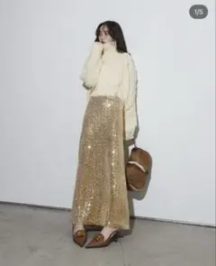 andrea&co. フェイクファーライダースベスト スパンコールスカート
