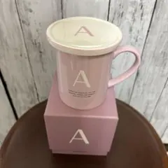 Francfranc Aのロゴ入りピンクマグカップ 蓋付き