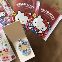 ハローキティ　チェーン付きファスナーケース2個と日焼けキティラバーストラップ水色