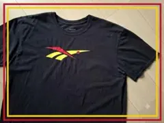 ​【US古着】リーボック ベクターロゴ Tシャツ 黒 XL ビッグシルエットのサムネイル