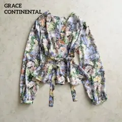 GRACE CONTINENTAL  フラワープリントフリル 花柄 ボウタイ グレースコンチネンタル フラワープリントフリルトップ 36 ボウタイ 花