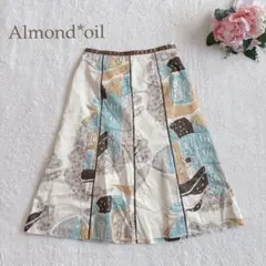 アーモンドオイル　街並み柄 Aラインスカート　縦ライン　膝下　大人かわいい