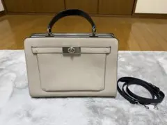 コーチ、ベージュレザー ハンドバッグ ショルダーストラップ付き