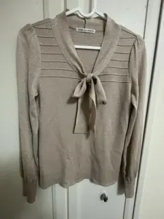 fare la corte ベージュ ラメ ボウタイリボン トップス