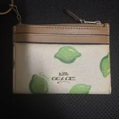 コーチ ジップカードケース レモン柄