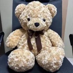 ベージュのリボン付きぬいぐるみ - メルカリ