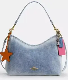 新品]限定品COACHローアン バケット バッグ・ラブド デニム・チャーム