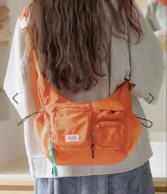 niko and オリジナルライトパッカブルマルチショルダーバッグ　オレンジ