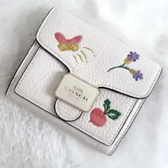 COACH コーチ　折り財布　ホワイト　白色　ドリーミーベジー柄 花 蝶々 美品