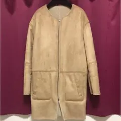 Another Editionフェイクムートンリバーシブルノーカラーコートのサムネイル