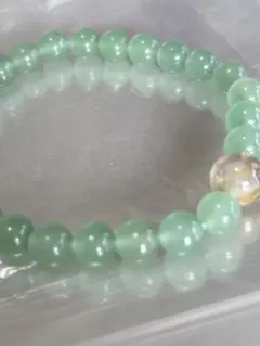 赤字覚悟今月末までの値段天然石翡翠ビーズブレスレットルチルクォーツ黄金針入り二個