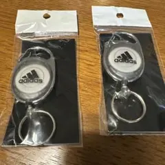 adidas メタルキーホルダー シルバー　リール２個セット 新品、未開封品のサムネイル