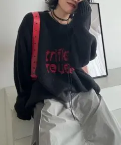 黒の刺繍入り長袖ニットのサムネイル