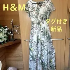 H＆Mのボタニカル柄 フレア袖 ロングワンピース34。値札付き未使用。のサムネイル