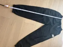 New Balance ブラック スウェットパンツ