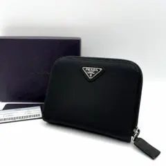 kk/4.30】PRADA ラウンドファスナー 二つ折り財布 三角ロゴM606 - メルカリ