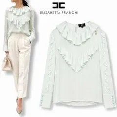 ELISABETTA FRANCHI シルクフリルブラウス カメリアモチーフ42 ELISABETTA FRANCHI シルクフリルブラウス カメリアモチーフ42 - メルカリ