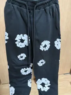 DENIM TEARS 花柄スウェットパンツ
