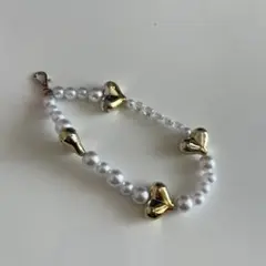 ハート型パーツのスマホショルダーストラップ