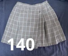 140★ユニクロ　UNIQLO　GIRLS　チェックミニスコート