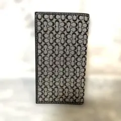 COACH コ－チ　手帳カバー 新品‼️ お札入れとして　17×9 黒ロゴ