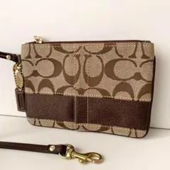 【COACH】コーチ　リストレットポーチ　ジャガードシグネチャー　ベージュ　茶色