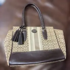 COACH シグネチャー トートバッグ タッセル付き - メルカリ