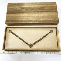 金色の帯留め・根付