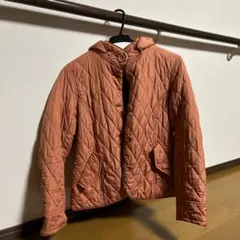 オレンジ キルティングジャケット フード付き