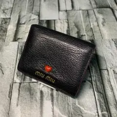 miu miu 二つ折り財布 黒 赤 - メルカリ