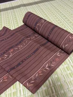 洗える着物 反物 ポリエステル 小紋 花草文様 小豆色 幅37cm 長さ12mのサムネイル