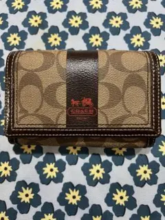 コーチ　二つ折り財布　ホースロゴ　シグネチャー　PVC　レザー　コンパクト