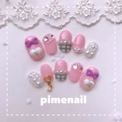 ゆめかわピンクバイカラーチェックリボンネイル