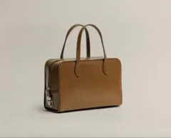 TOUT Y EST トゥティエSAC COQUILLE SMALL TAN - メルカリ