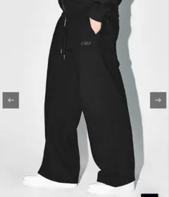 ブラック ワークパンツ ルーズフィット - メルカリ