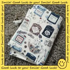 ハンドメイド✿文庫本✿ブックカバー✿紅茶猫ちゃん✿生成り✕ネイビートーン