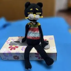 黒猫オッドアイのあみぐるみ クロちゃん ハンドメイド - メルカリ