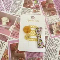 新品未使用 黄色のリボンとポンポン付きヘアピンセット