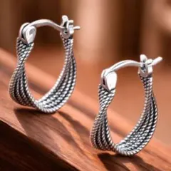ツイストデザイン フープピアス ニッチ レトロ 湾曲 ガンメタ