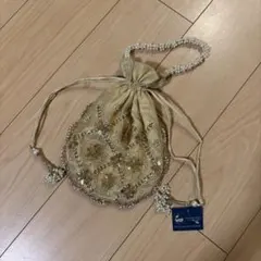 ビーズ刺繍のベージュ巾着ポーチ