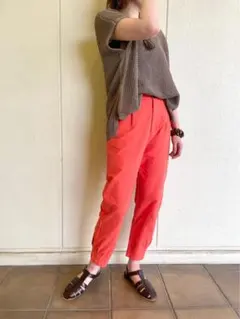 ジェナエスパスメルヴェイユ オレンジ コットン テーパードパンツ
