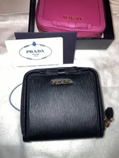 新品★PRADA★黒 ブラック★プチリボン★二折　コンパクト 財布★1ML522