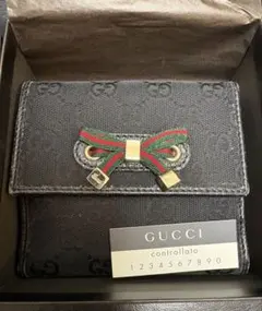 GUCCI GGキャンバス 二つ折り財布 リボン コンパクト シェリー | Mercari