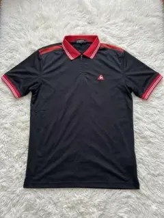 【美品】ルコックスポルティフ ゴルフ ハーフジップ ポロシャツ 黒×赤 Mのサムネイル