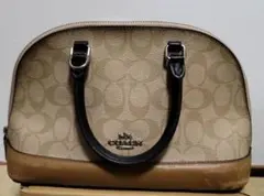 COACH ベージュ ロゴ入り ハンドバッグ